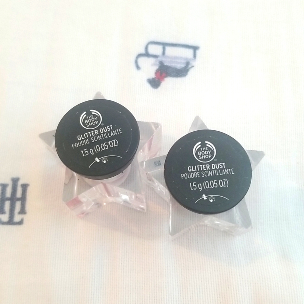 2 The body shop glitter dust pink and gold